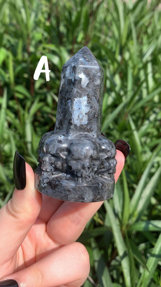 Larvikite Tower with skulls